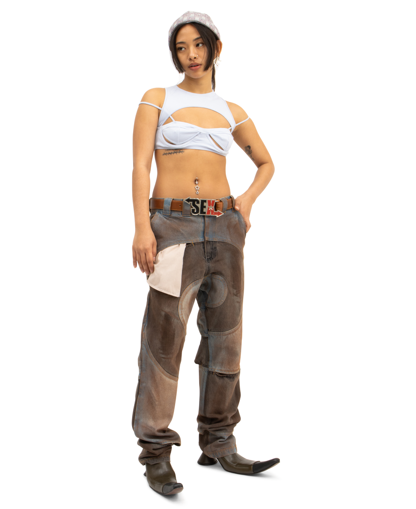 DIRTY SPIRAL CUT-OUT JEANS